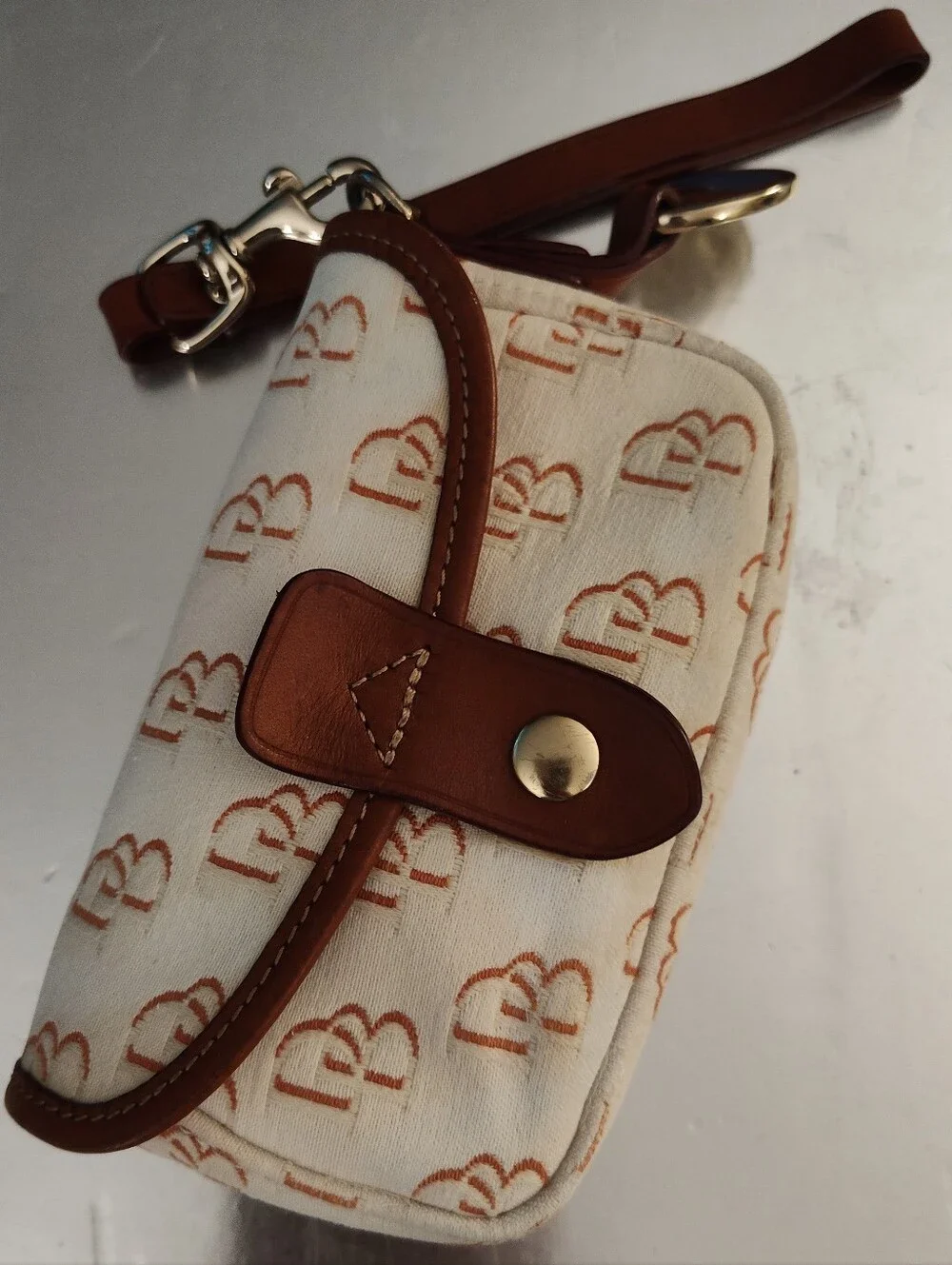 Dooney Bourke Vintage Wristlet Snap Repeating Logo, Cream/Tan